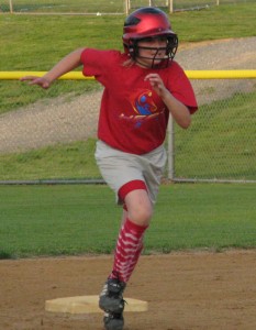 Softball_Player_Rounding_Bases